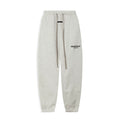 Fog Essentials Black‑Logo Light Oat Heather‑Grey Relaxed‑Fit Tapered Sweatpants